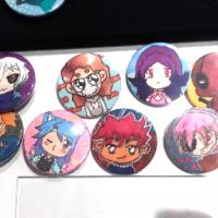 badges réalisés par les élèves en cours de dessin manga